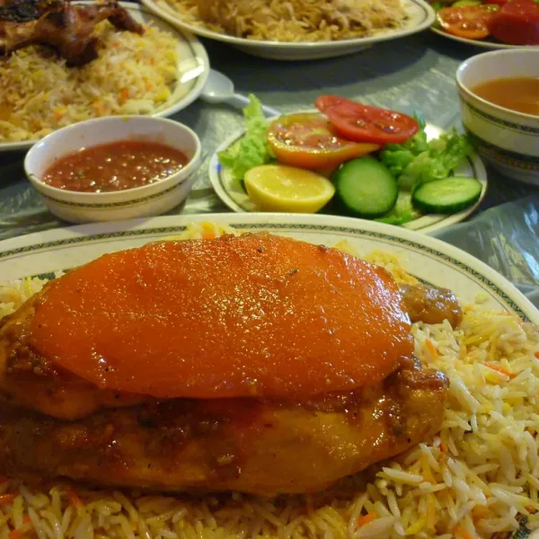 Rice, chicken and salads ready to serve